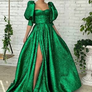 Teuta Matoshi emerald puff palace gown